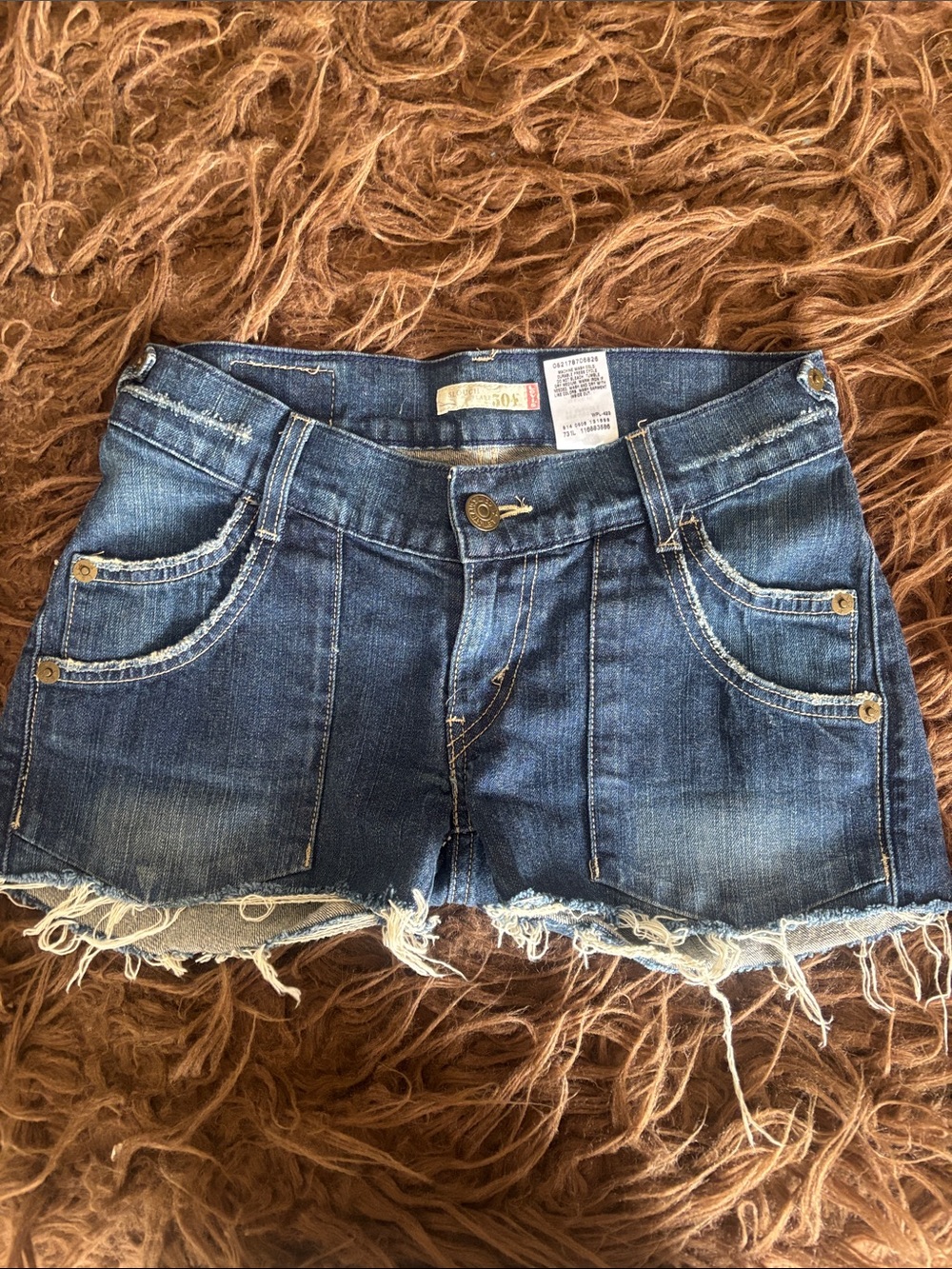 Levi’s Denim Cutoff Women’s Shorts - Blue Distressed. Size 5.
